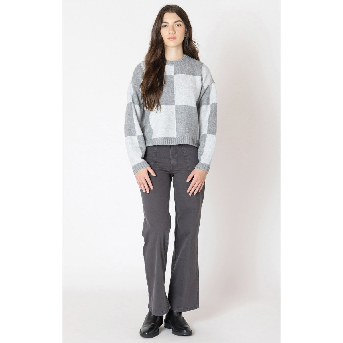 Dex Black Colour Block Crew Sweater on model with grey blocks and long sleeves.