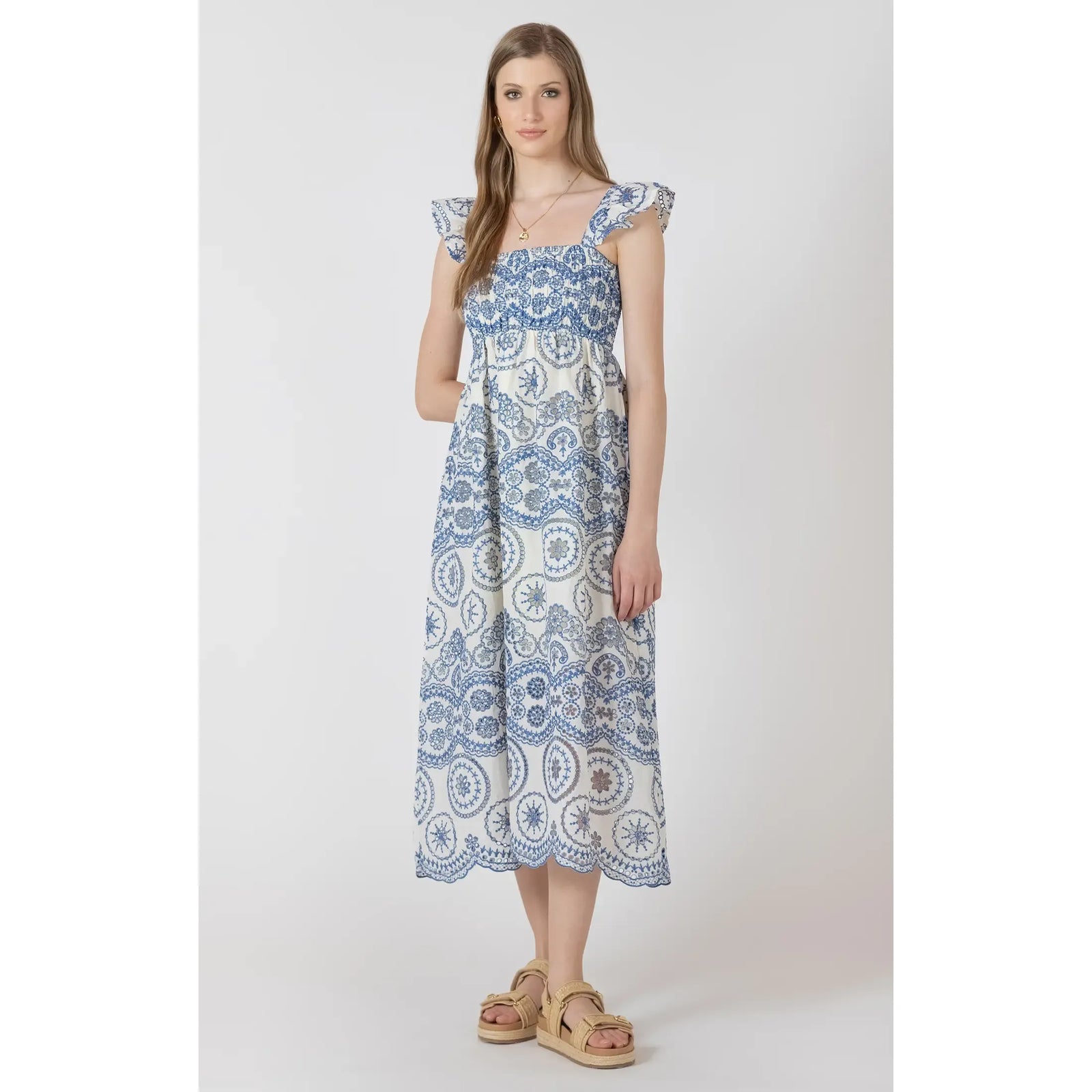 Dex V Waist Maxi Dress in blue embroidery with ruffled straps, floor-length.