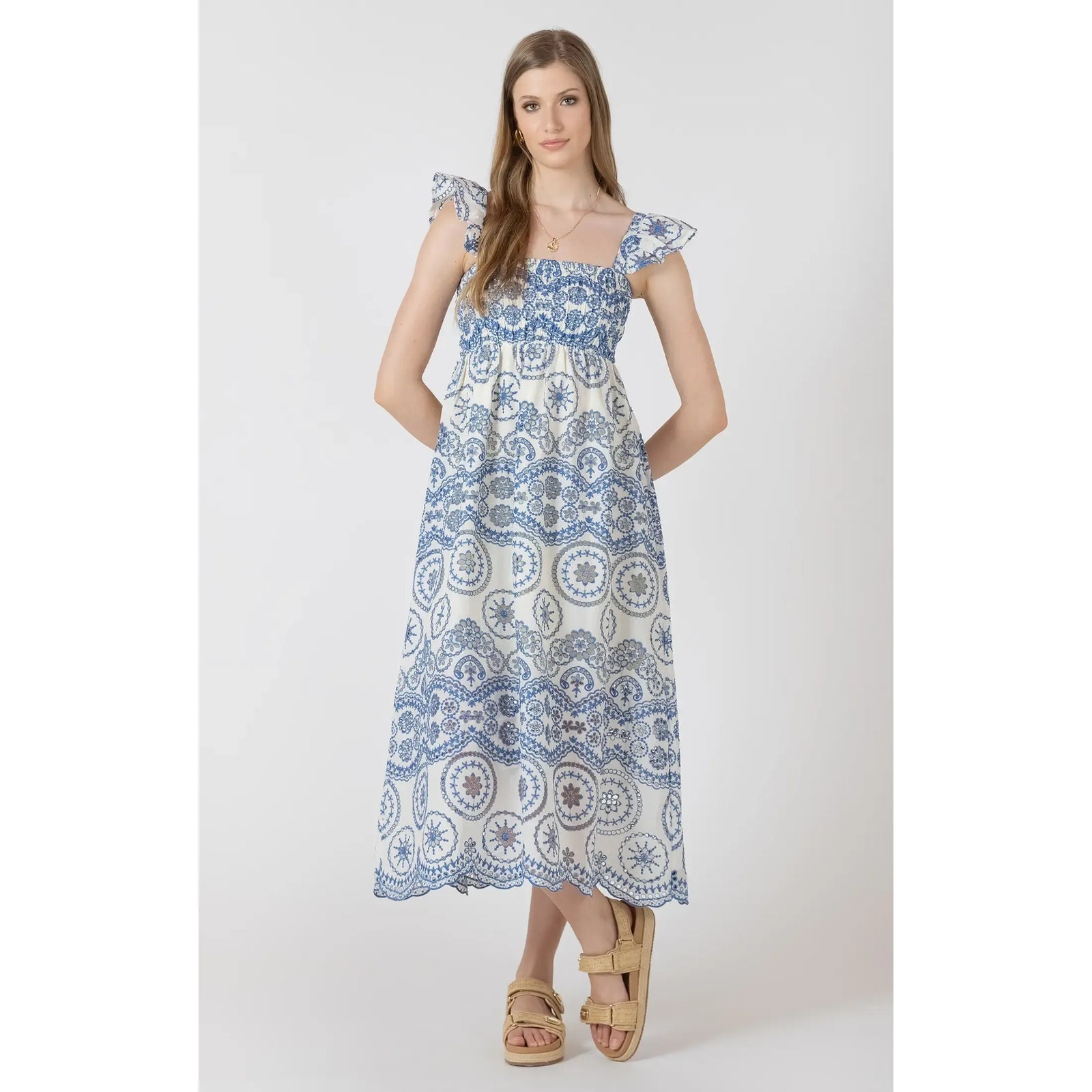 Dex V Cutout Embroidered Maxi Dress with blue pattern, smocked bodice and flutter sleeves.