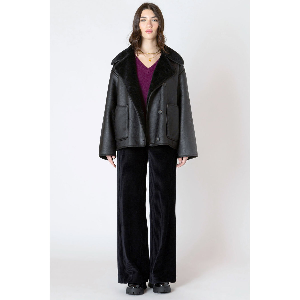 Dex Double Faced Sueded Jacket in faux suede with sherling lining, oversized fit, front pockets and button closures.