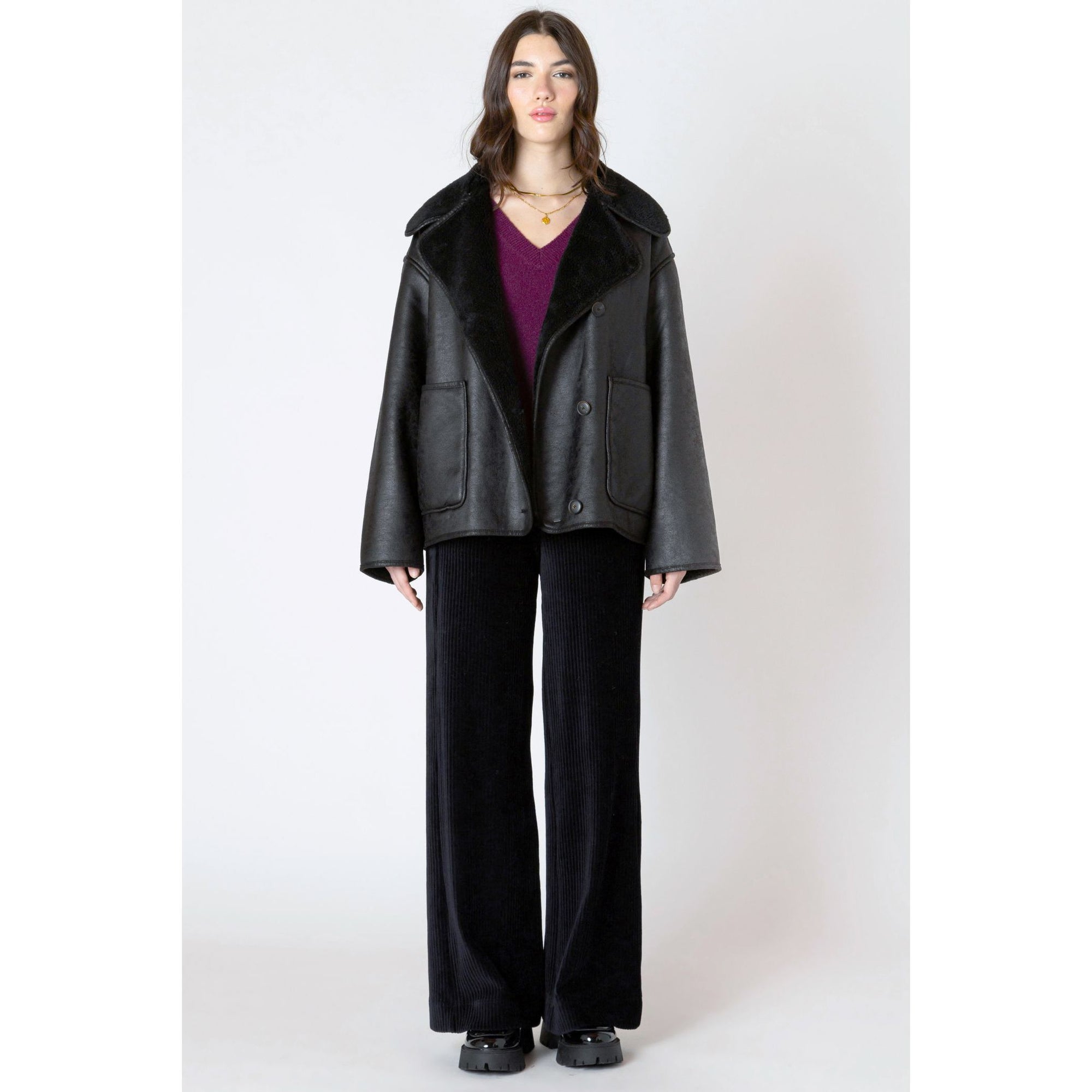 Dex Double Faced Sueded Jacket in faux suede with sherling lining, oversized fit, front pockets and button closures.