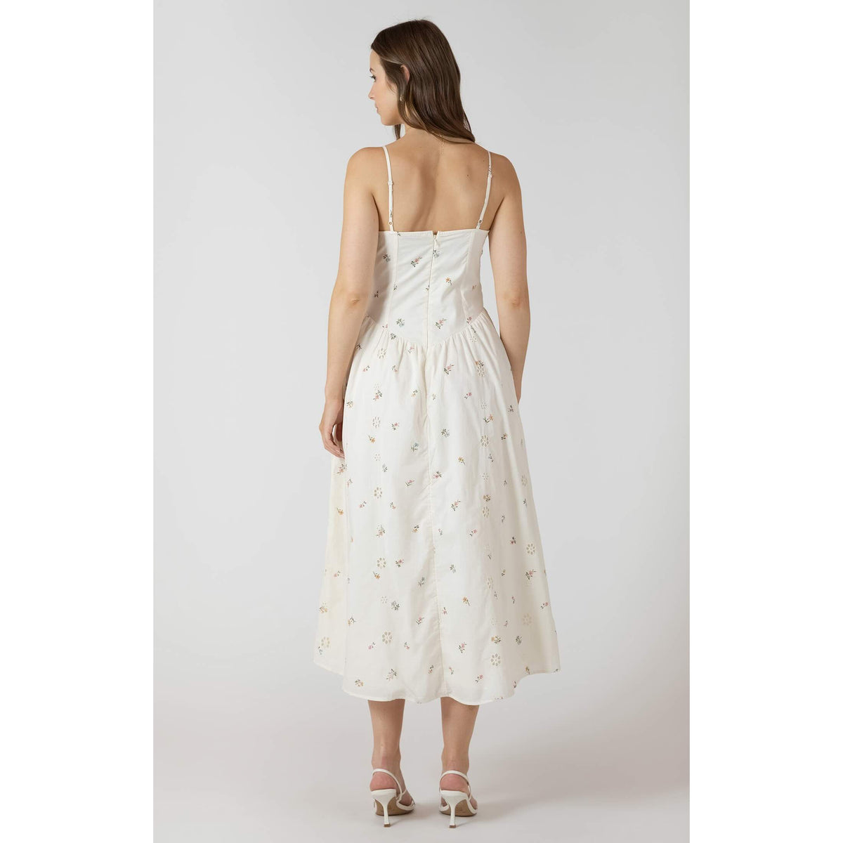 Dex Smocked Detail Midi Dress in ivory with floral embroidery and thin straps, back view.