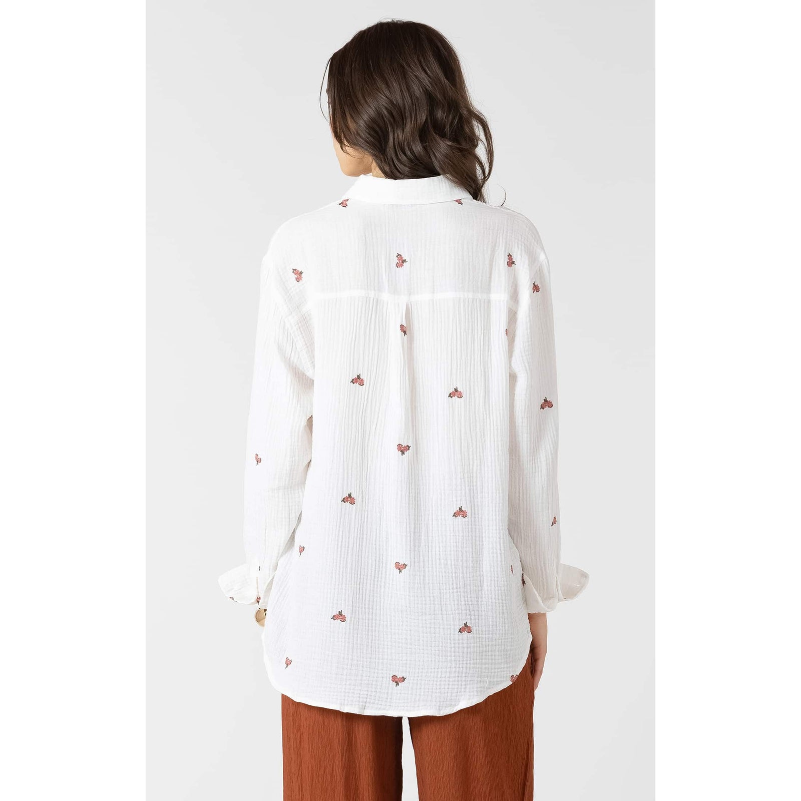 Dex Textured Floral Blouse: white textured fabric with small pink floral embroidery, long sleeves, relaxed fit.