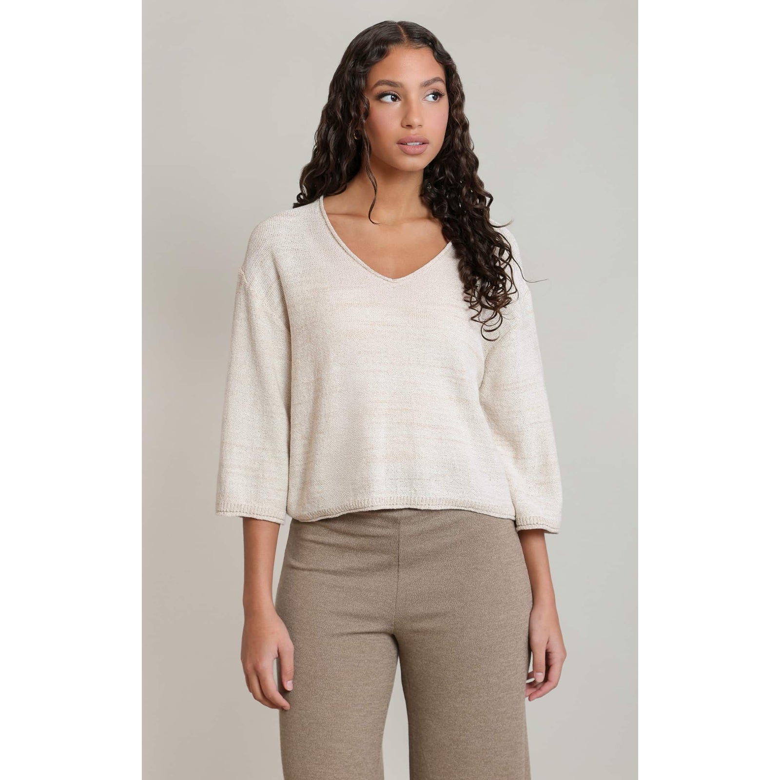 Dex V-Neck 3/4 Sleeve Knit Top in soft beige, cropped silhouette with a relaxed knit on a model.