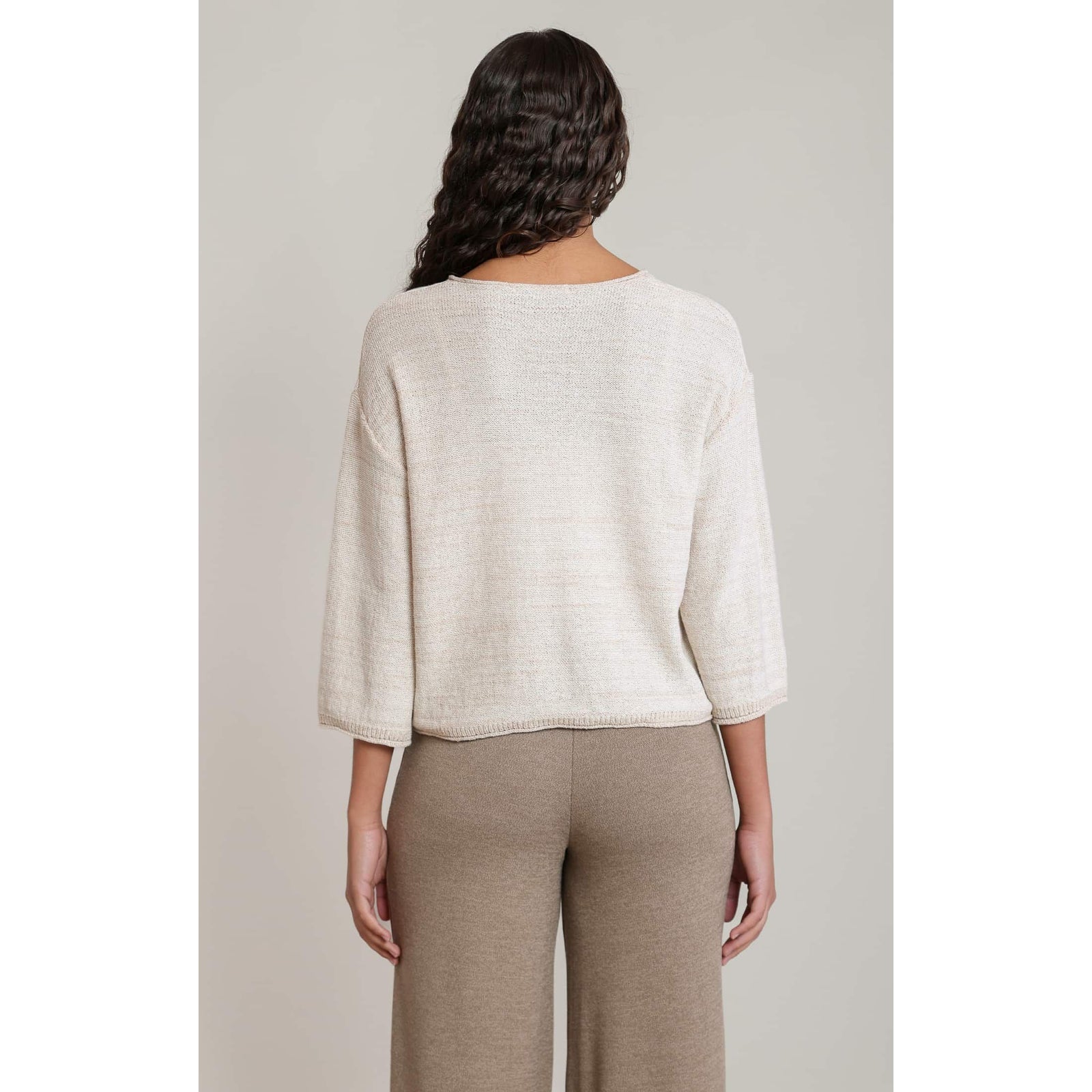 Back view of cream Dex V-Neck 3/4 Sleeve Knit Top on model.
