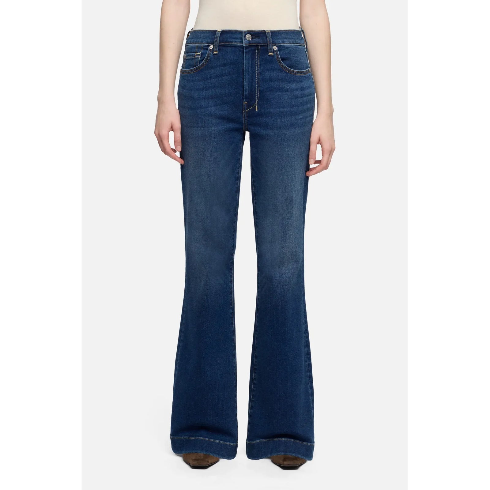 7 for all Mankind Dojo in Melrose jeans, mid-rise flare contouring waist to hips into a long, lean silhouette.
