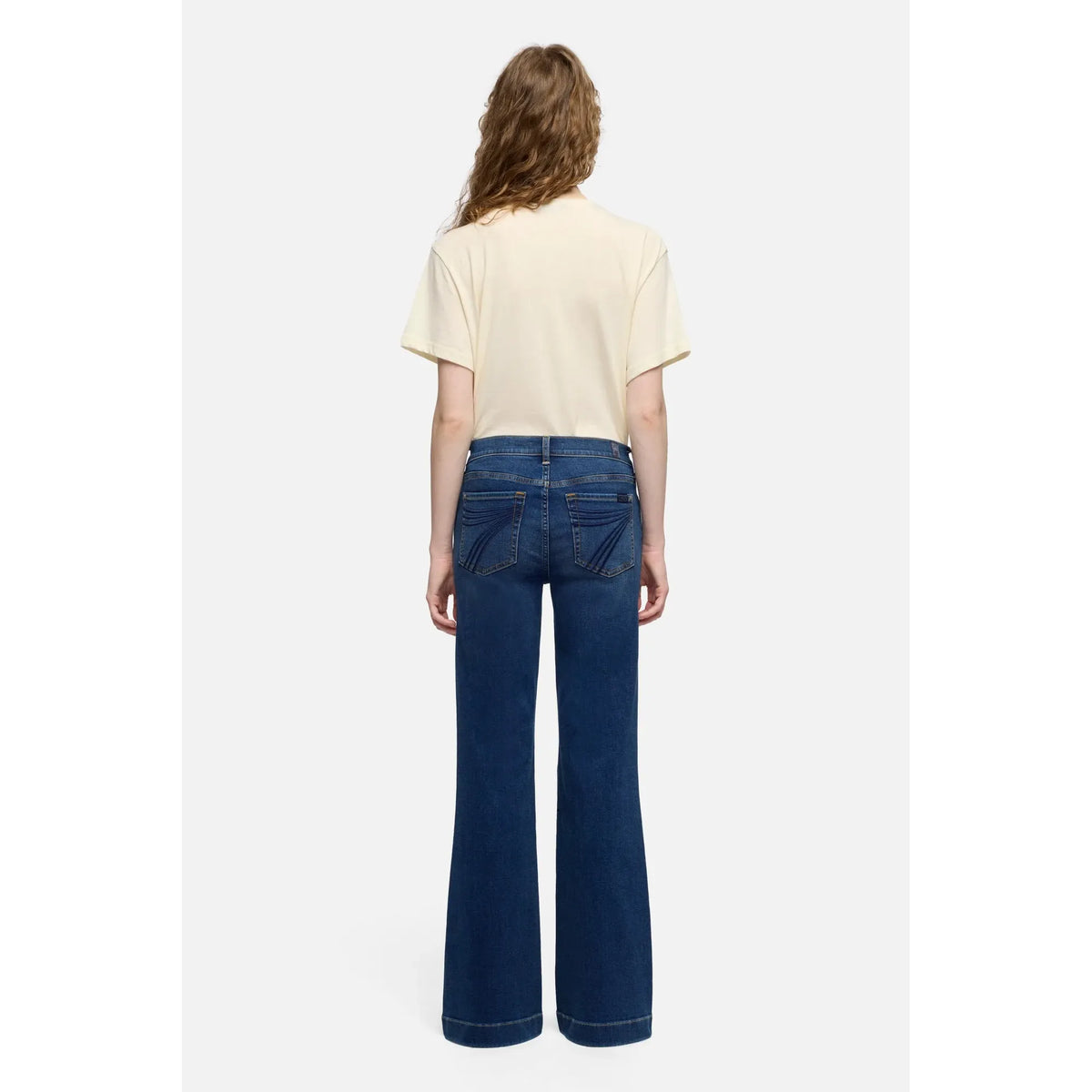 7 for all Mankind Dojo in Melrose jeans, mid-rise flare with tailorless inseam and long silhouette.