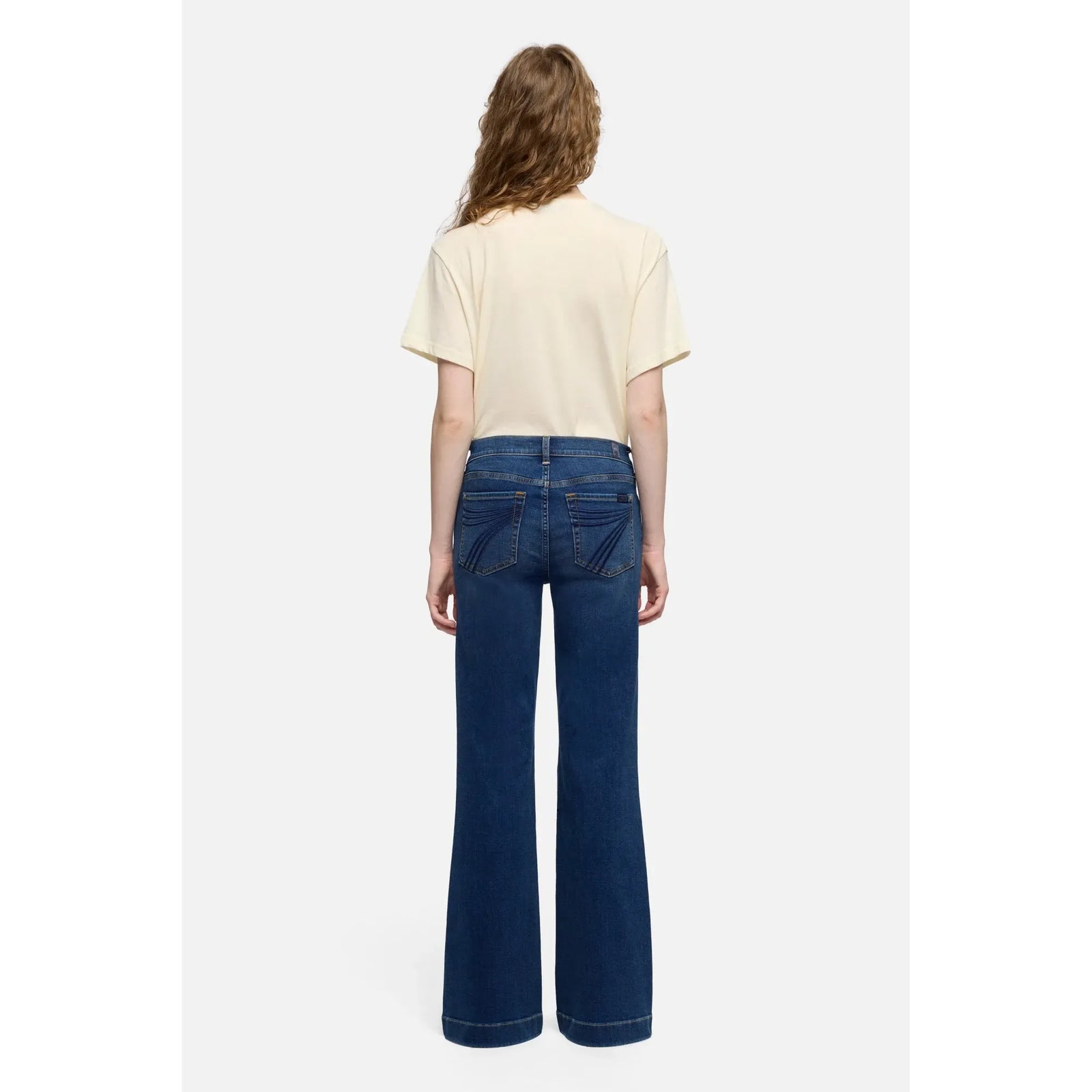 7 for all Mankind Dojo in Melrose jeans, mid-rise flare with tailorless inseam and long silhouette.