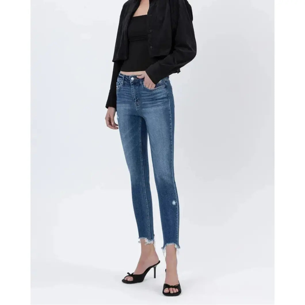 Woman showcasing the Flying Monkey Counter Attack High Rise Crop Skinny jeans, featuring a flattering fit and distressed details.