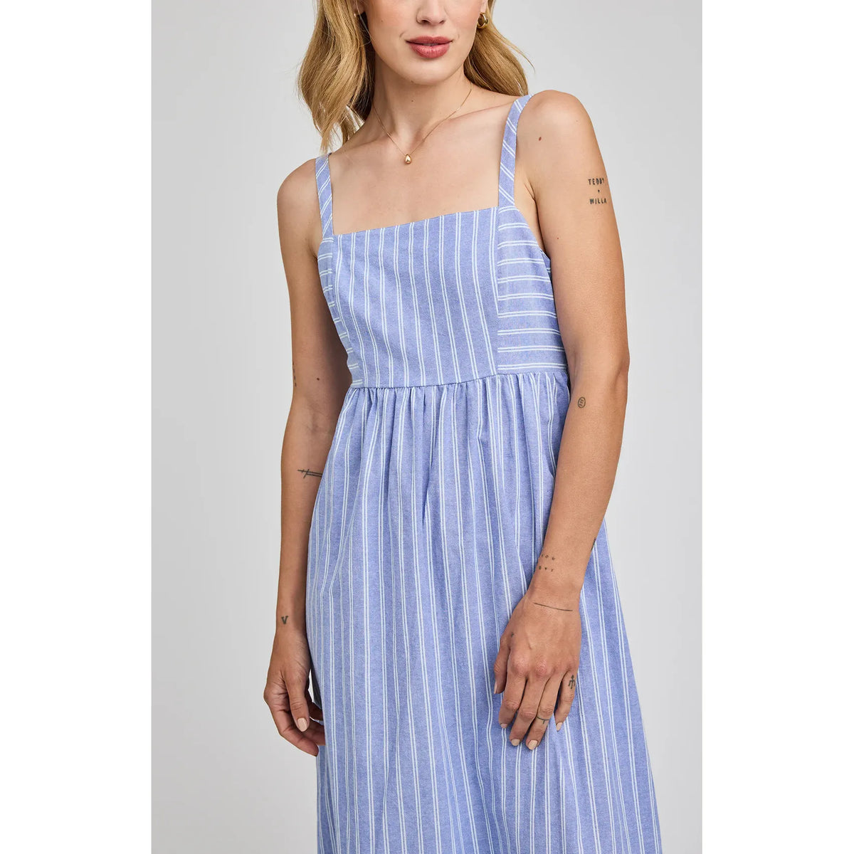 Gentle Fawn Alicia Dress in blue cotton poplin with white yarn-dyed stripes, adjustable straps, back tie.