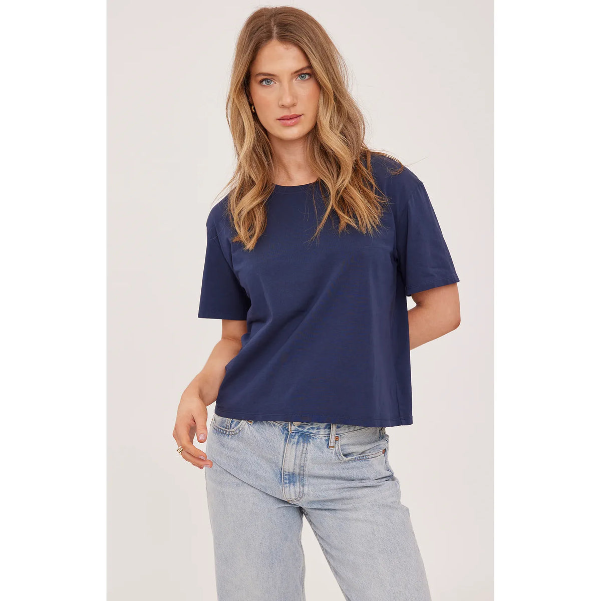 Gentle Fawn Brigitte Tshirt in navy, soft cotton jersey, garment dyed, relaxed crew neck on model.