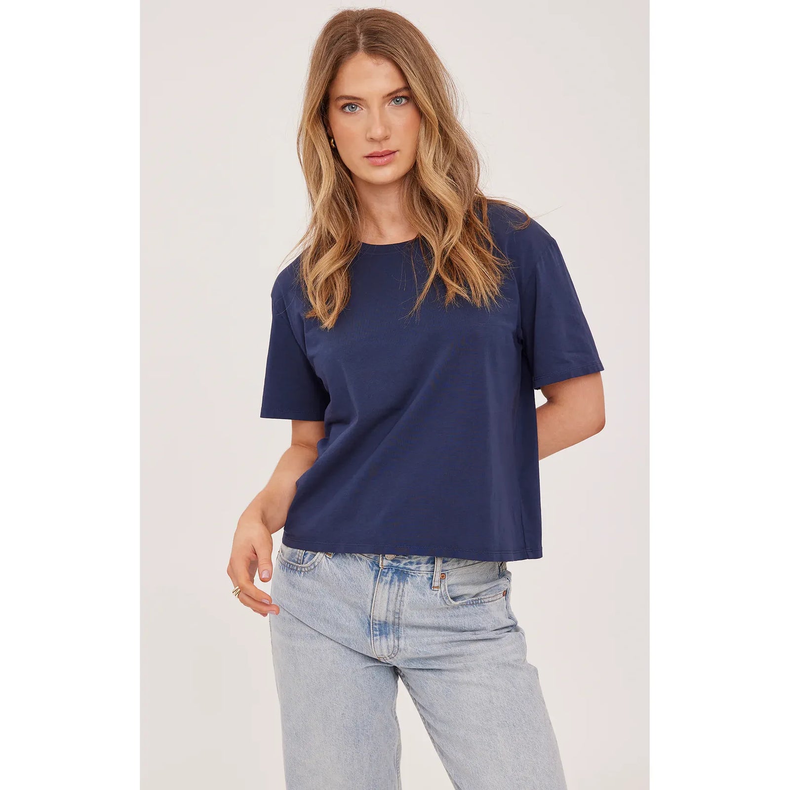 Gentle Fawn Brigitte Tshirt in navy, soft cotton jersey, garment dyed, relaxed crew neck on model.