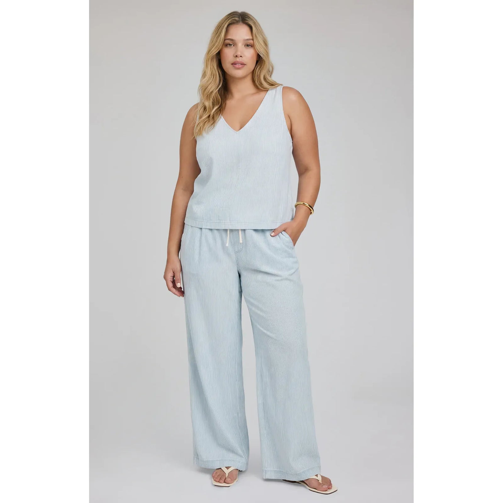 Camille Pant in light blue, wide-leg, mid-rise with elastic drawcord, slash pockets, textured 100% Tencel fabric.
