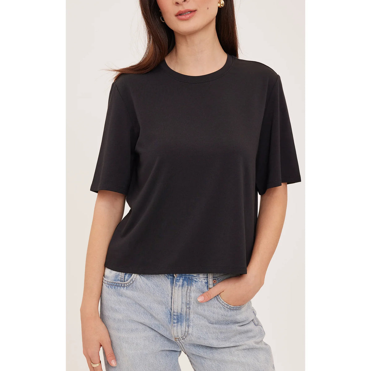Black relaxed-fit crew neck t-shirt with clean silhouette, soft cotton-modal blend, and casual daytime comfort.