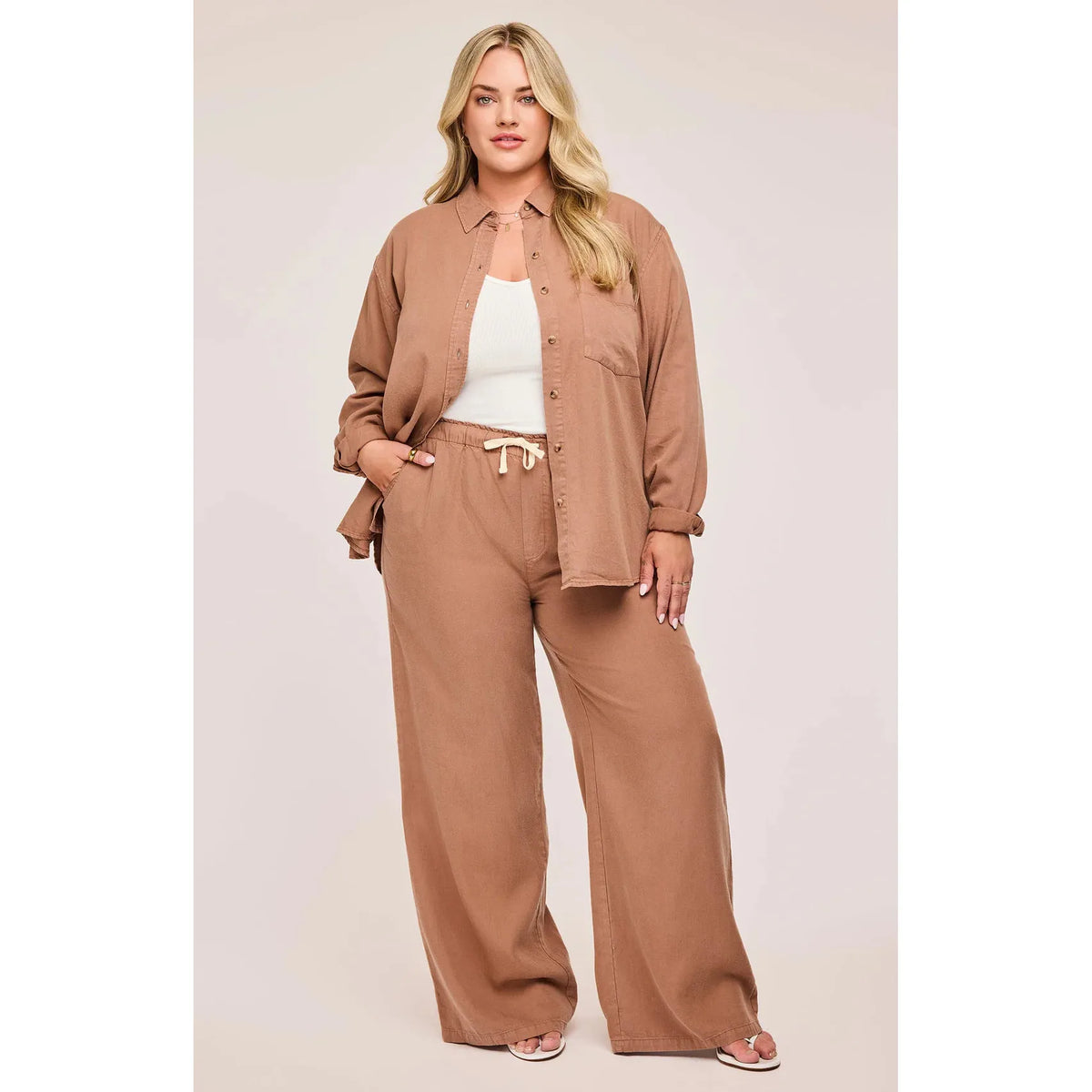 Luxurious Gentle Fawn Elio Pant in desert hue, featuring Tencel fabric and comfortable elastic waistband.