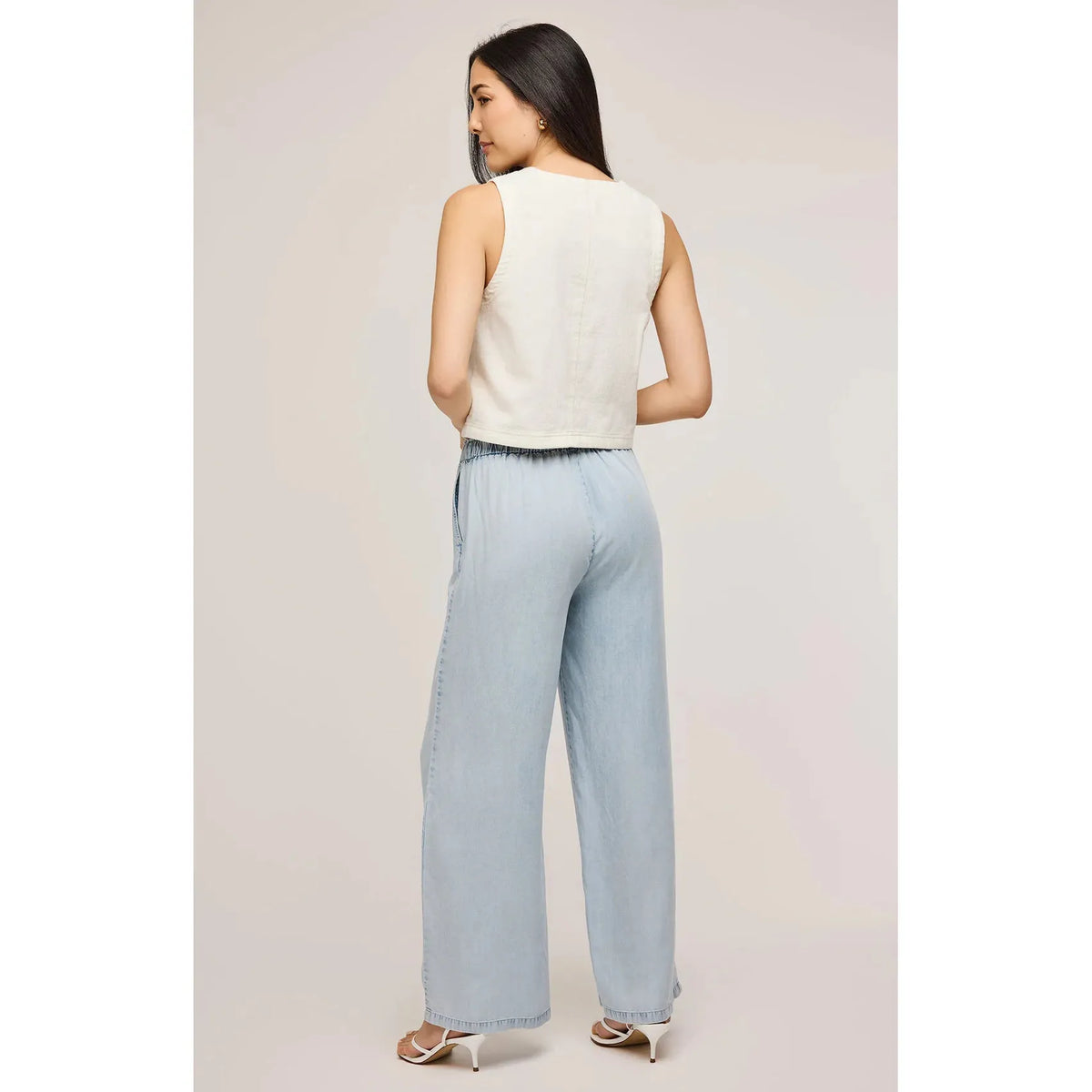 Stylish back view of the Gentle Fawn Elio Pant in light blue, showcasing its soft Tencel fabric and comfortable fit.