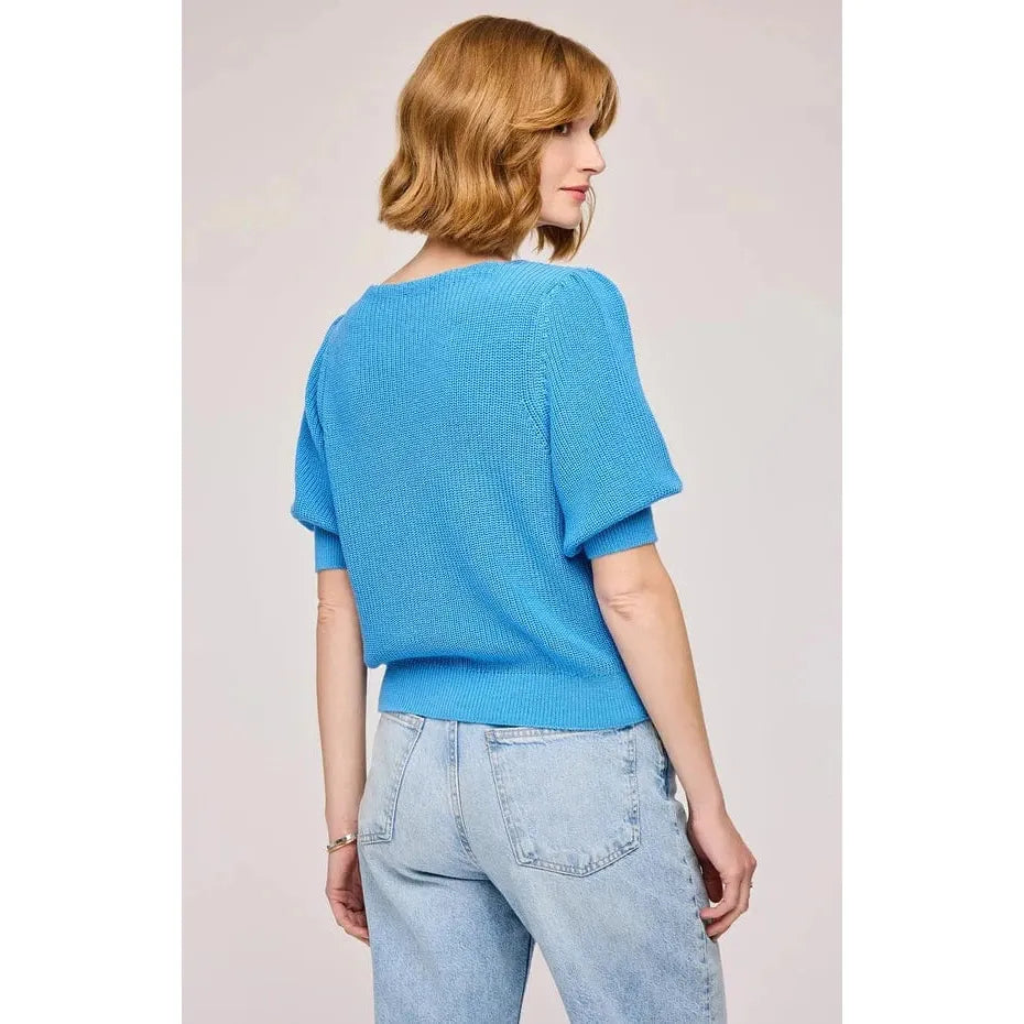 Gentle Fawn Phoebe V-Neck Sweater in blue knit with puff sleeves, back view.