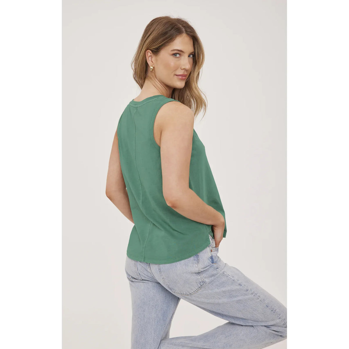 Gentle Fawn Giselle Tank in sage green cotton jersey with a relaxed, lived-in silhouette on a model.