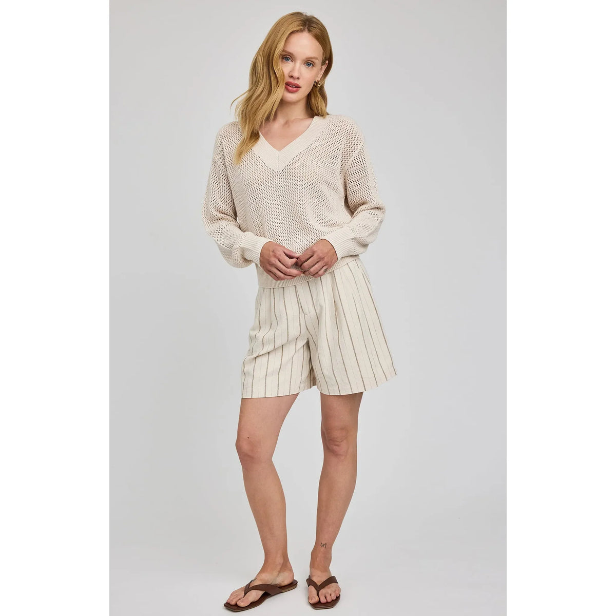 Gentle Fawn Jensen V-Neck Pullover in beige, open-knit, relaxed-fit knit on model.