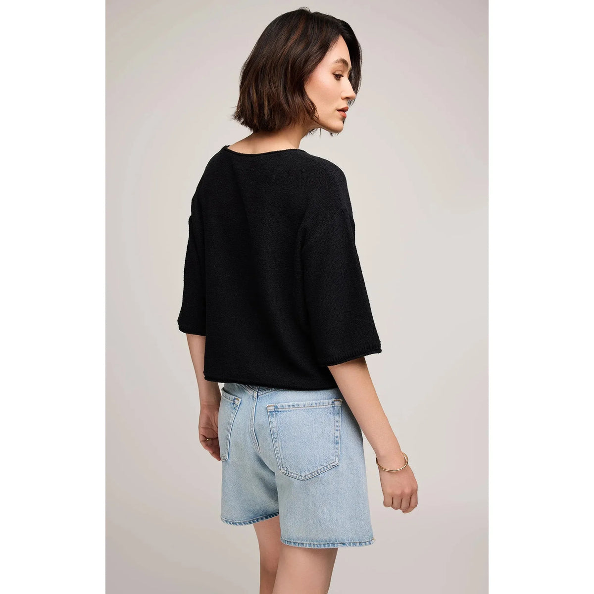 Gentle Fawn Kerrigan Sweater in black knit with relaxed fit on model.