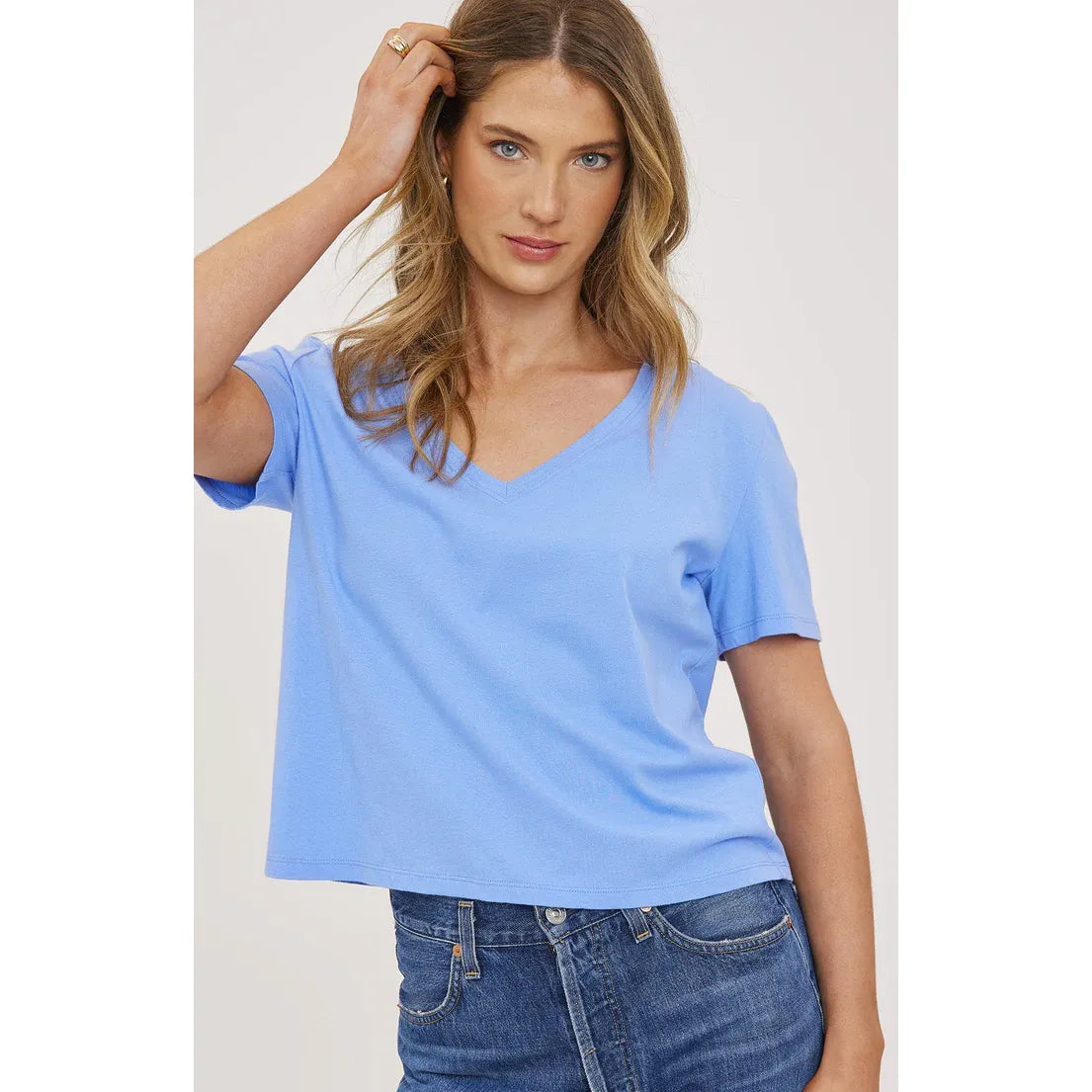 Gentle Fawn Lucy Top, light blue cropped V-neck cotton shirt worn by a model
