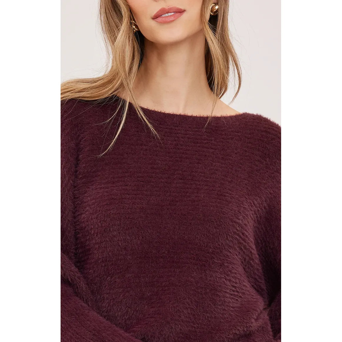 Plush deep Port Mara sweater with wide boat neckline and chunky cardigan-stitch knit. Relaxed dolman sleeve pullover perfect for fall.