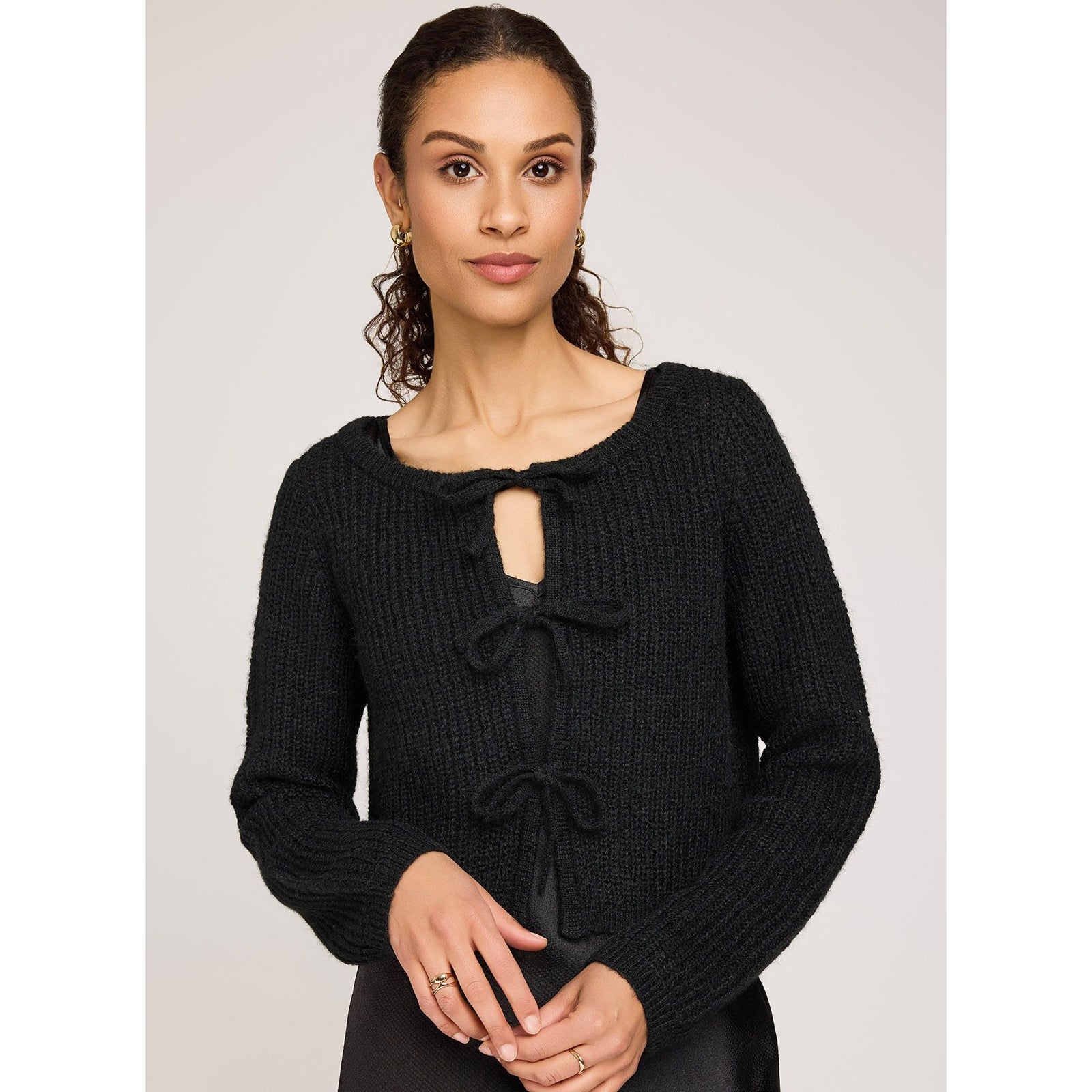 Gentle Fawn Shayla Tie Front Cardigan on a model, black ribbed fuzzy knit with tie-front details for fall layering.