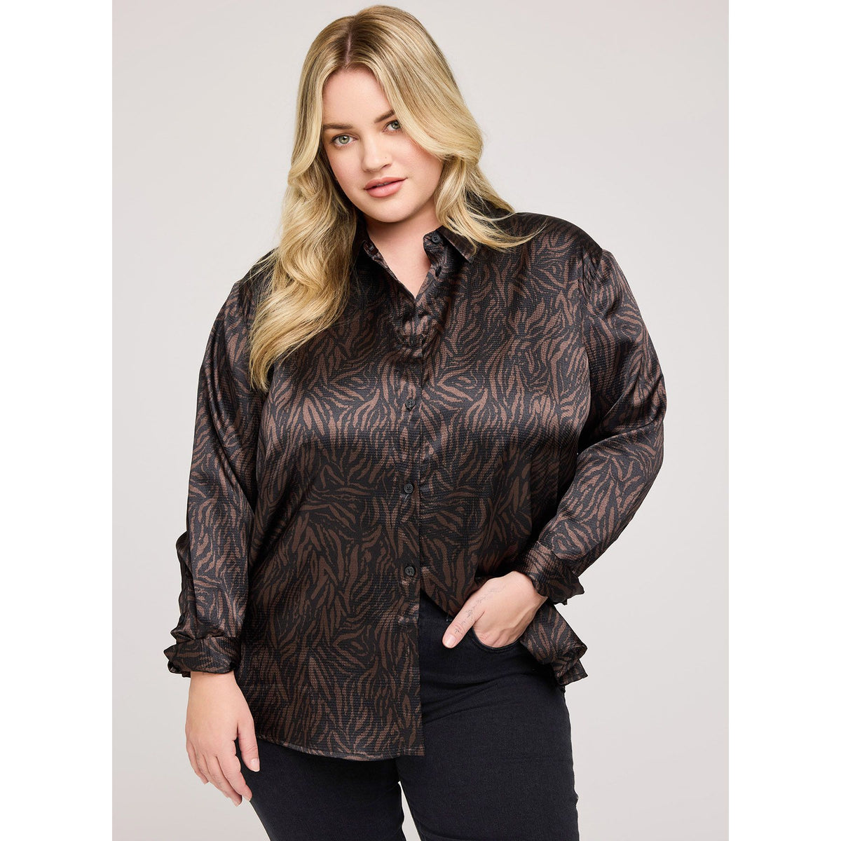 Gentle Fawn Simone blouse in hammered satin with a dark brown leaf-pattern and long sleeves.
