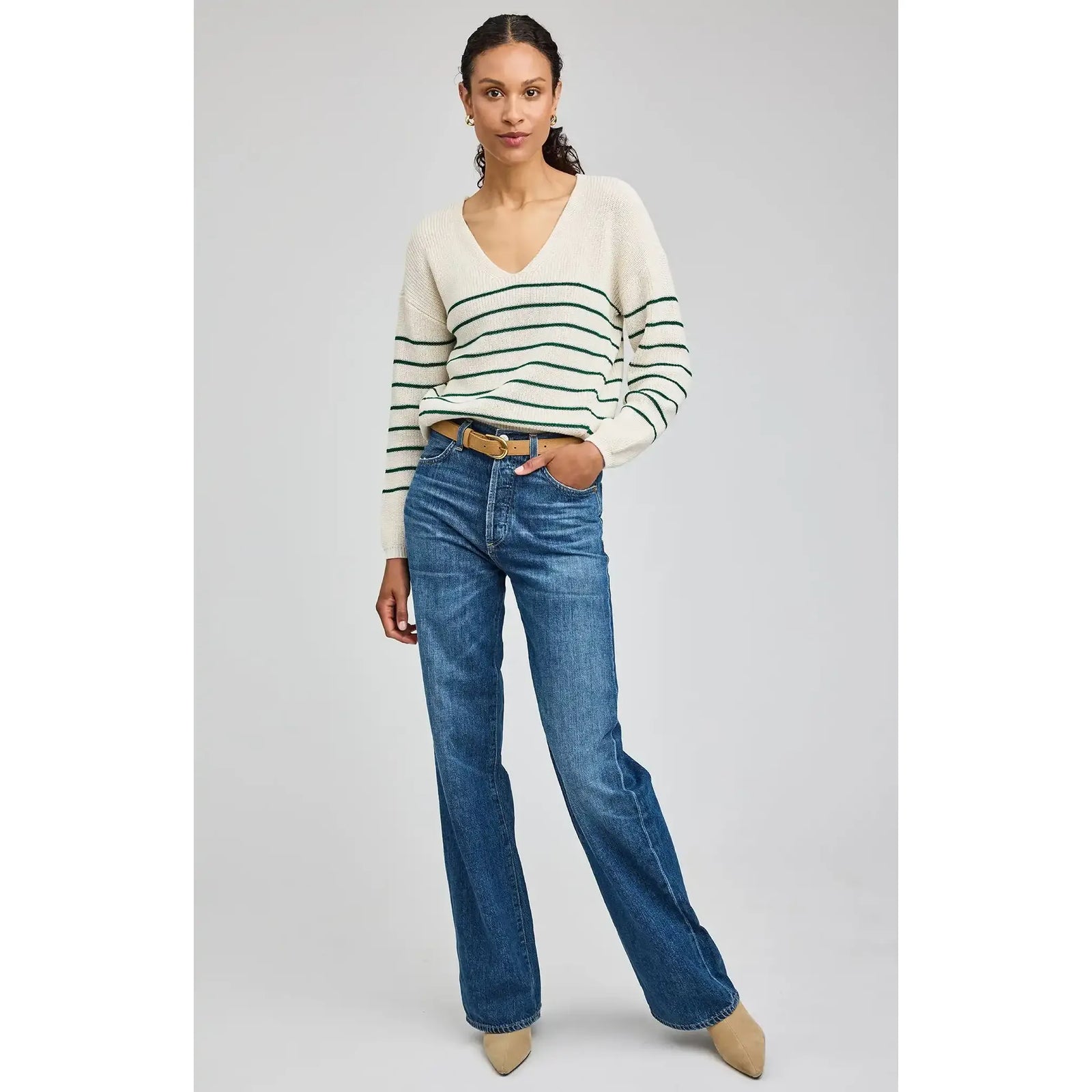 Gentle Fawn Tucker Pullover: V-neck cream knit with green stripes, relaxed fit, styled with jeans.