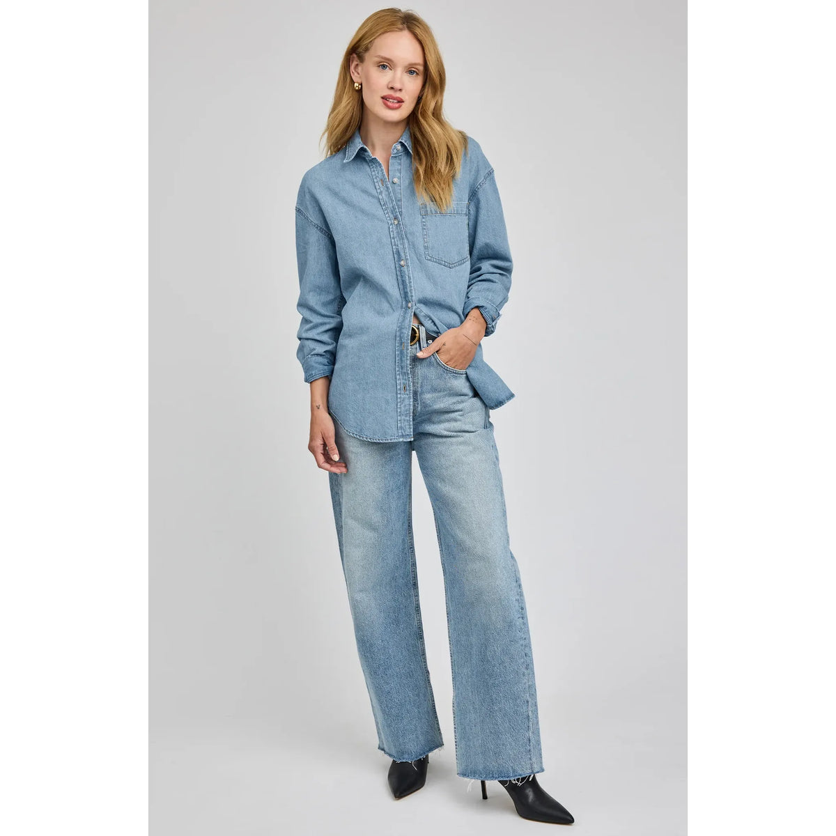 Gentle Fawn Whitney light-wash denim shirt worn with matching jeans; casual button-front with a front patch pocket.