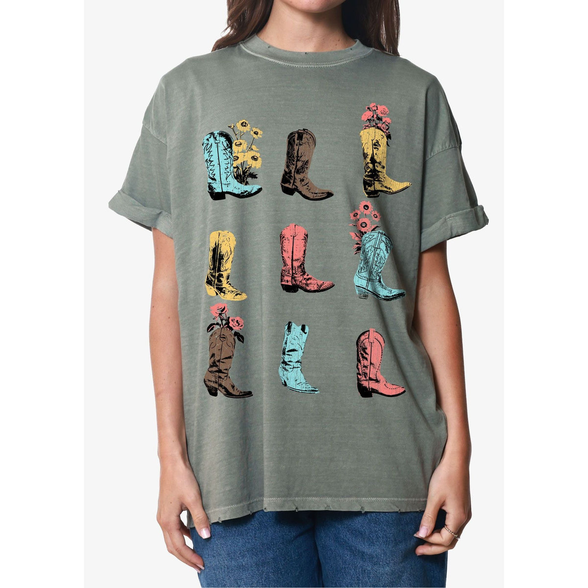 Oversized sage-green boyfriend tee with colorful cowboy boots and flowers print.