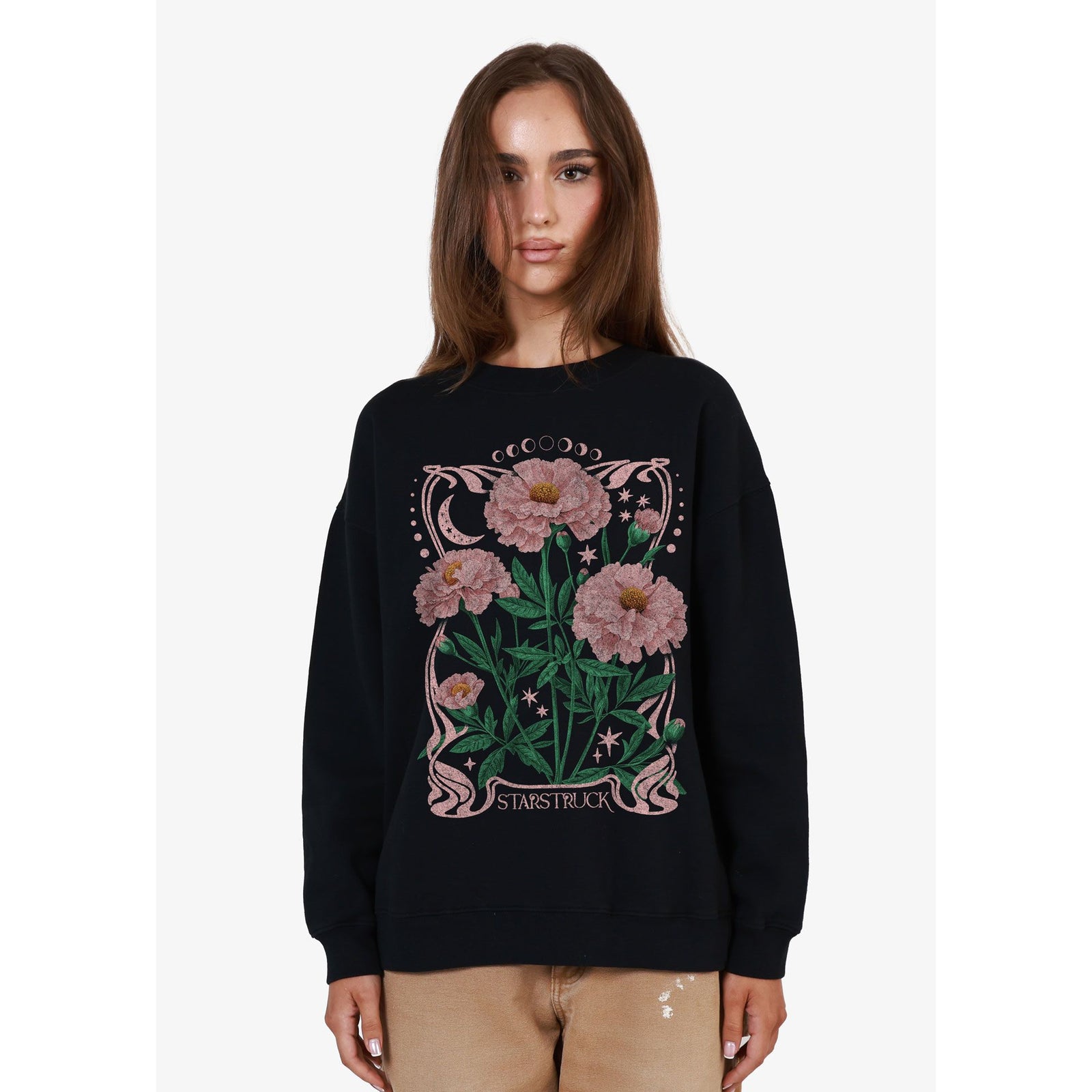 Girl Dangerous Starstruck Oversized Crew Sweatshirt on model, black with pink floral print.