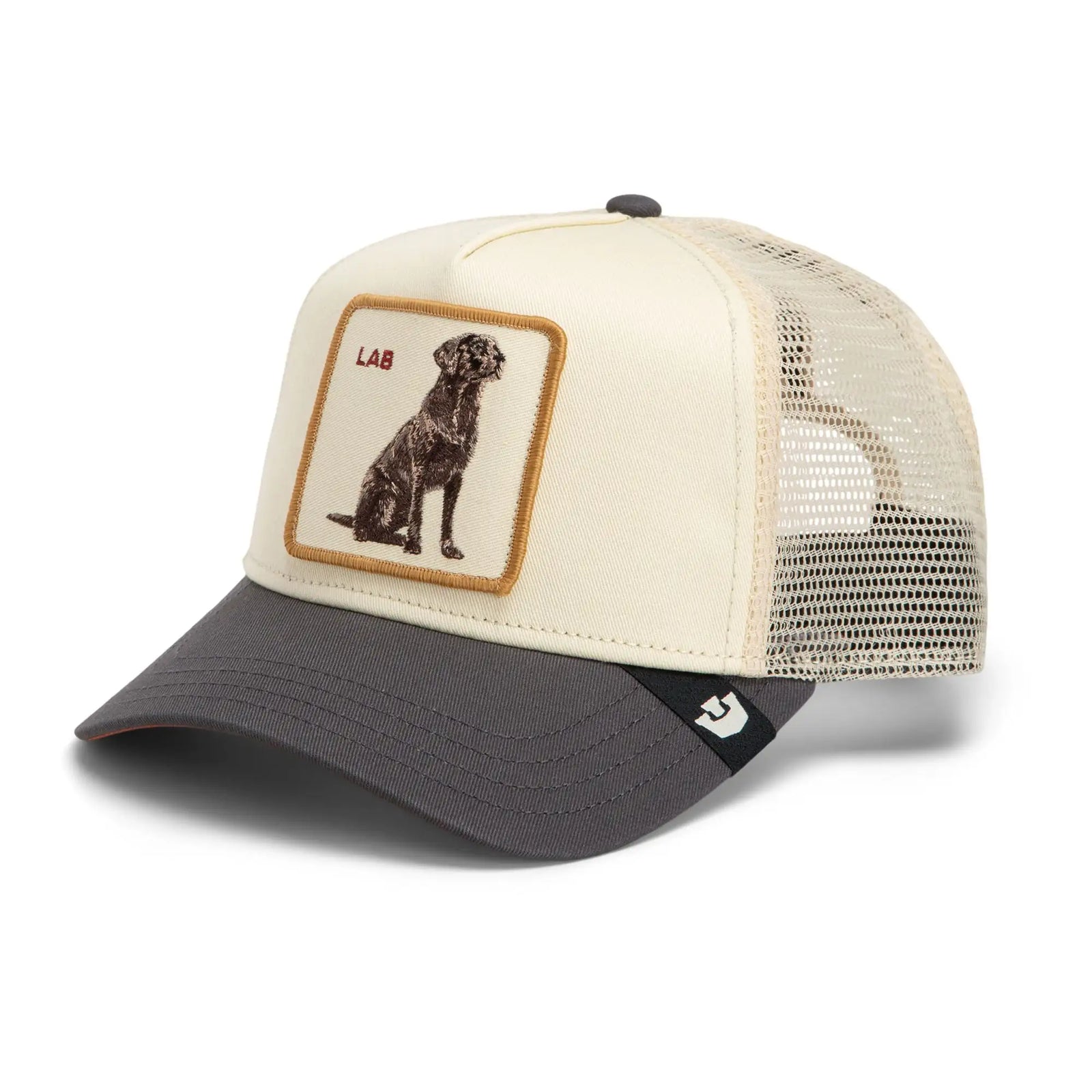 Goorin Bros Shadow Lab Trucker Hat with embroidered dog patch, cream front, and dark grey visor.