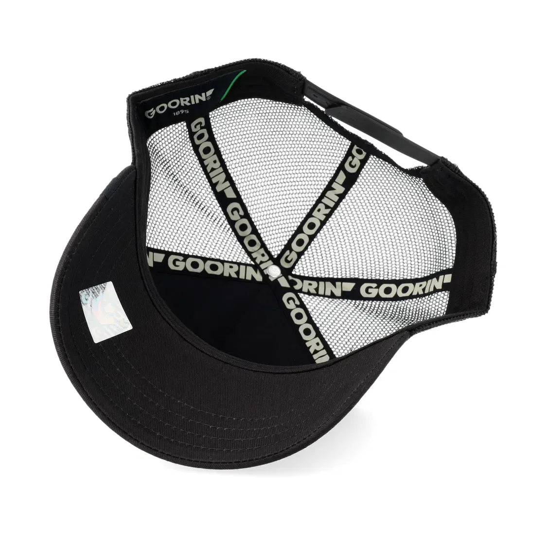Back view of black Goorin Bros Tonal Skull Trucker Hat featuring branded inner sweatband and adjustable closure.