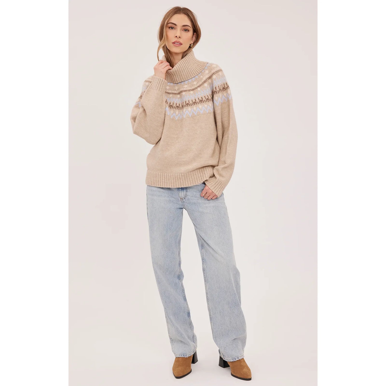 Gentle Fawn Freya Sweater with Fair Isle pattern, relaxed fit, and ribbed turtleneck details paired with light denim.