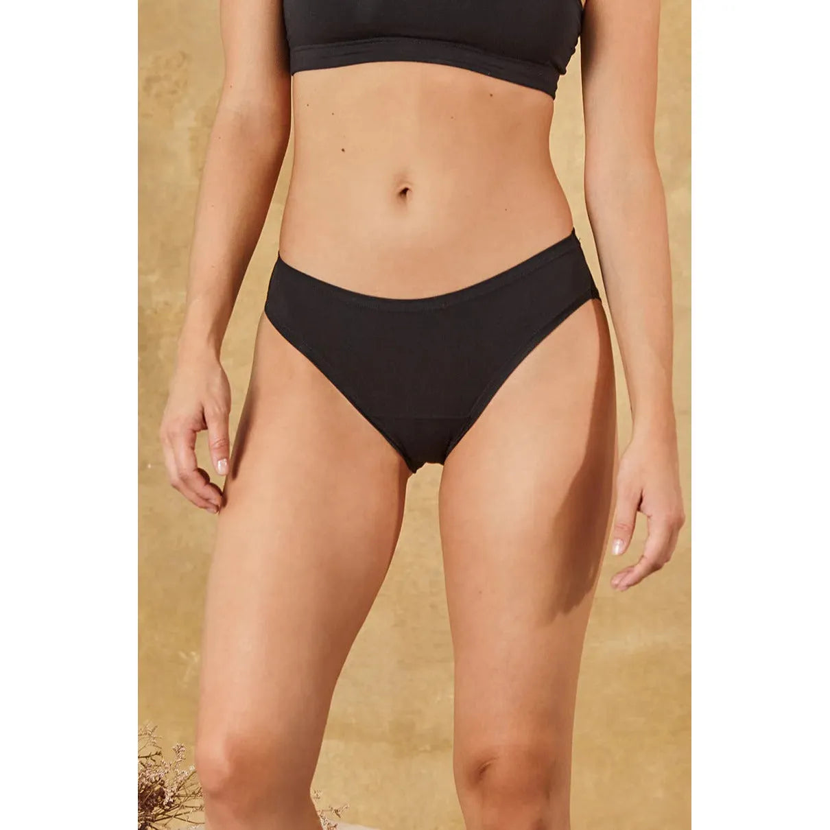 HuHa Bikini Mineral Undies in black, made from sustainable TENCEL™ fibers for lasting freshness and comfort.