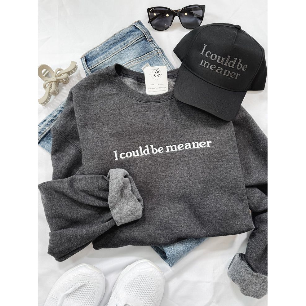 Dark heather gray sweatshirt from Blonde Ambition Collection, with white "I could be meaner" on chest.