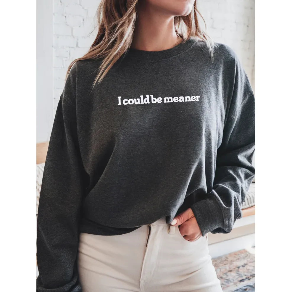 Dark heather gray sweatshirt from Blonde Ambition Collection, with white "I could be meaner" on chest.