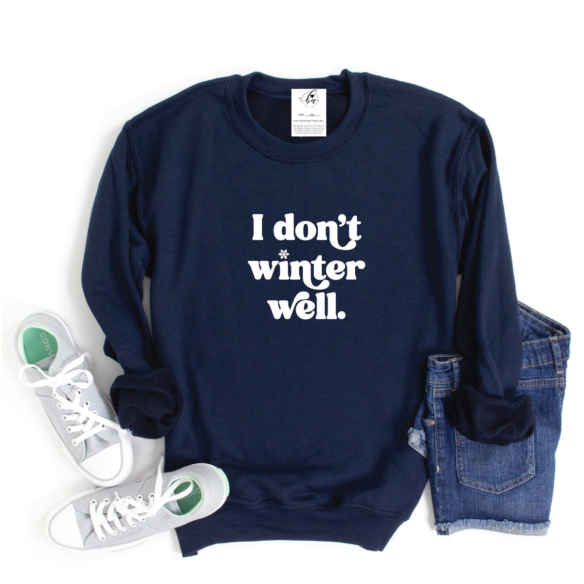 I Don't Winter Well Crew Sweater in navy with bold white slogan, cozy warmth, classic crewneck.