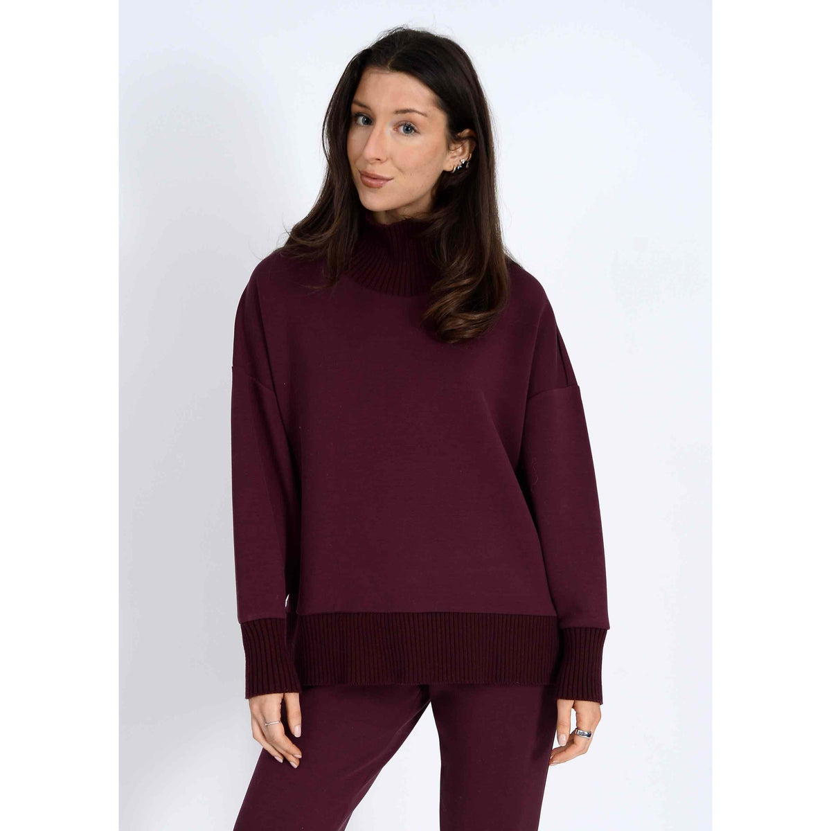 Katelyn Soft Knit Sweater in burgundy: oversized knit with ribbed cuffs, hem, and high collar.