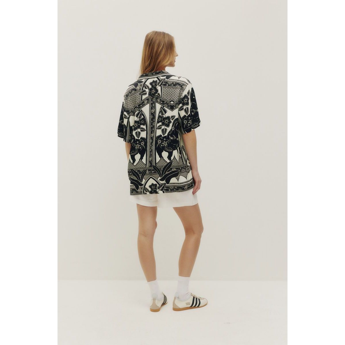 Kuwalla Beach Shirt Western Boho: black-and-white palm-print relaxed beach shirt on model