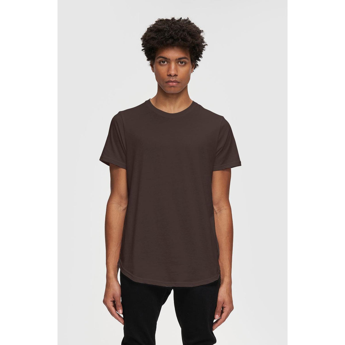 Kuwalla Scoop Tee: lightweight scooped-hem tee on a model, comfortable all seasons.