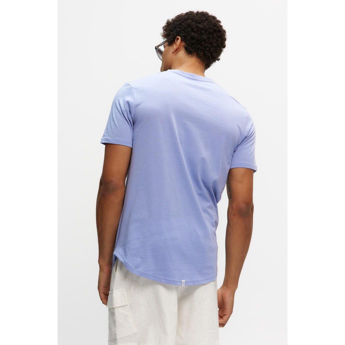 Kuwalla Scoop Tee, light purple, back view with scooped hem and slim fit.