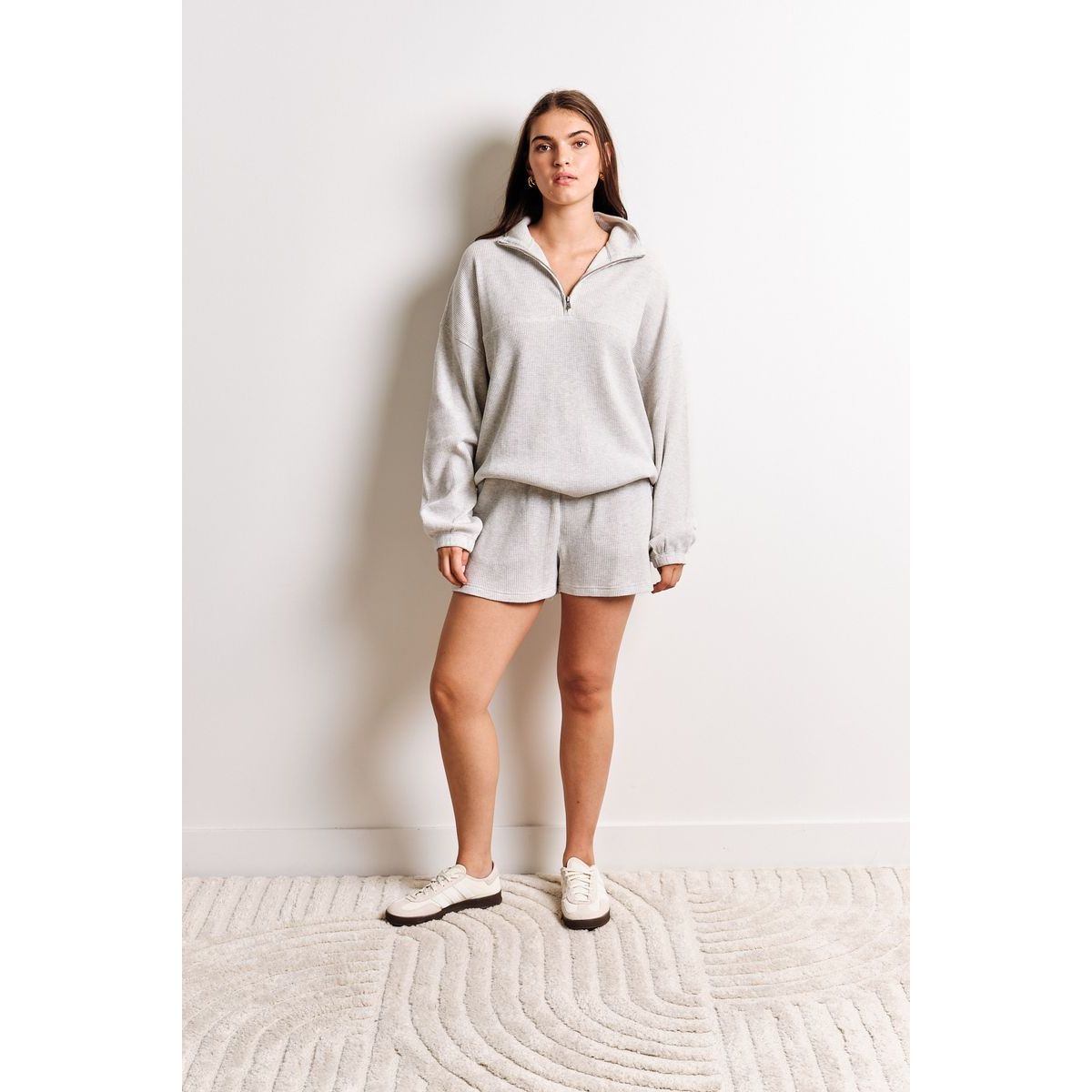Kuwalla Tyla Waffle Shorts in light gray with a matching relaxed-knit zip-up for casual athleisure.