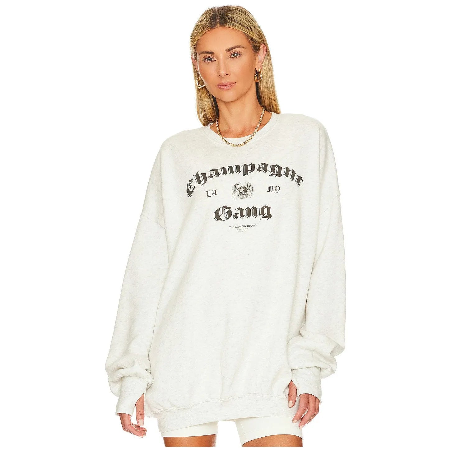 Cozy and stylish, the Laundry Room Champagne Gang Jumper features a fun graphic design perfect for casual wear.