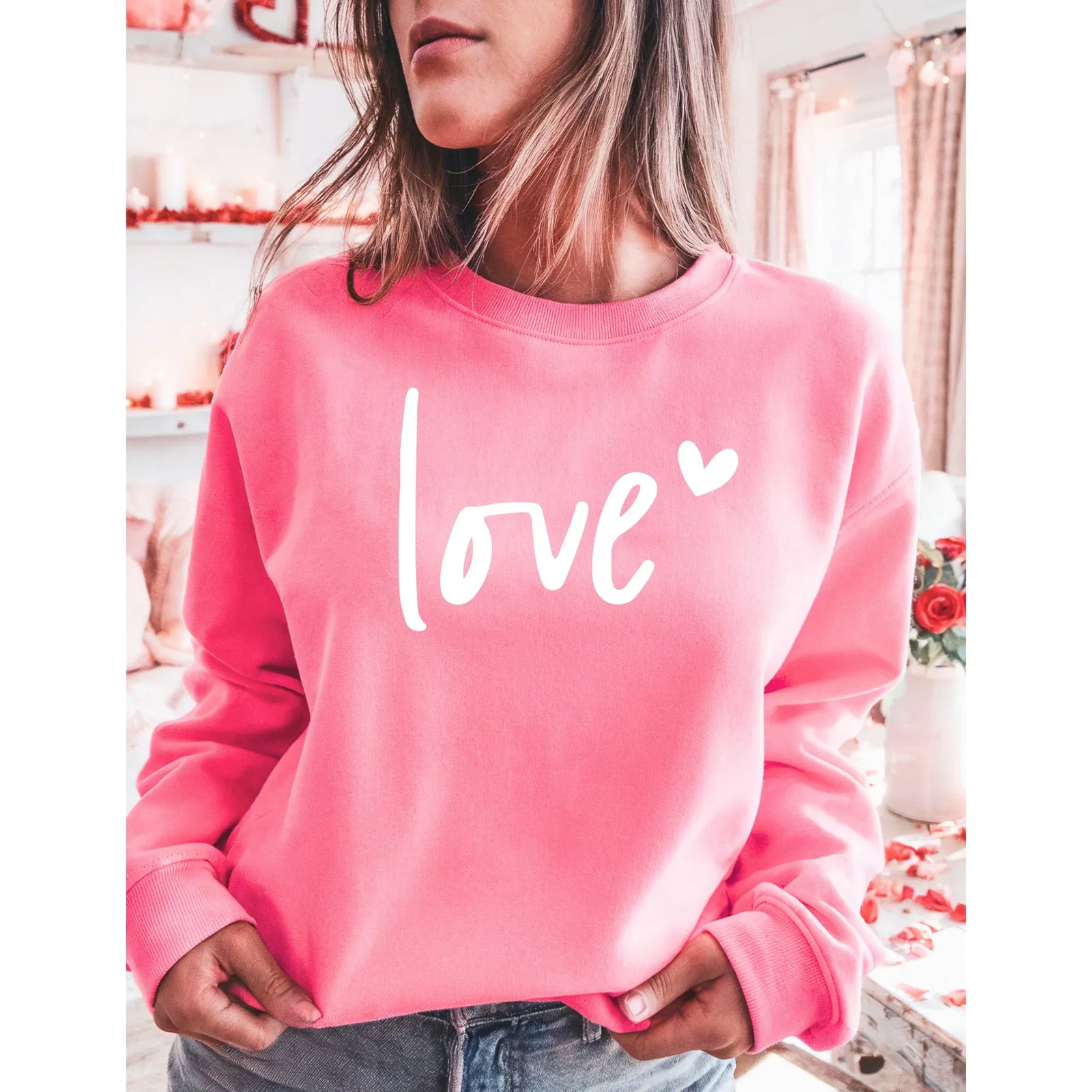 Neon pink Love Classic Crew 50/50 cotton-poly unisex crew neck sweater with white 'Love' script and heart.