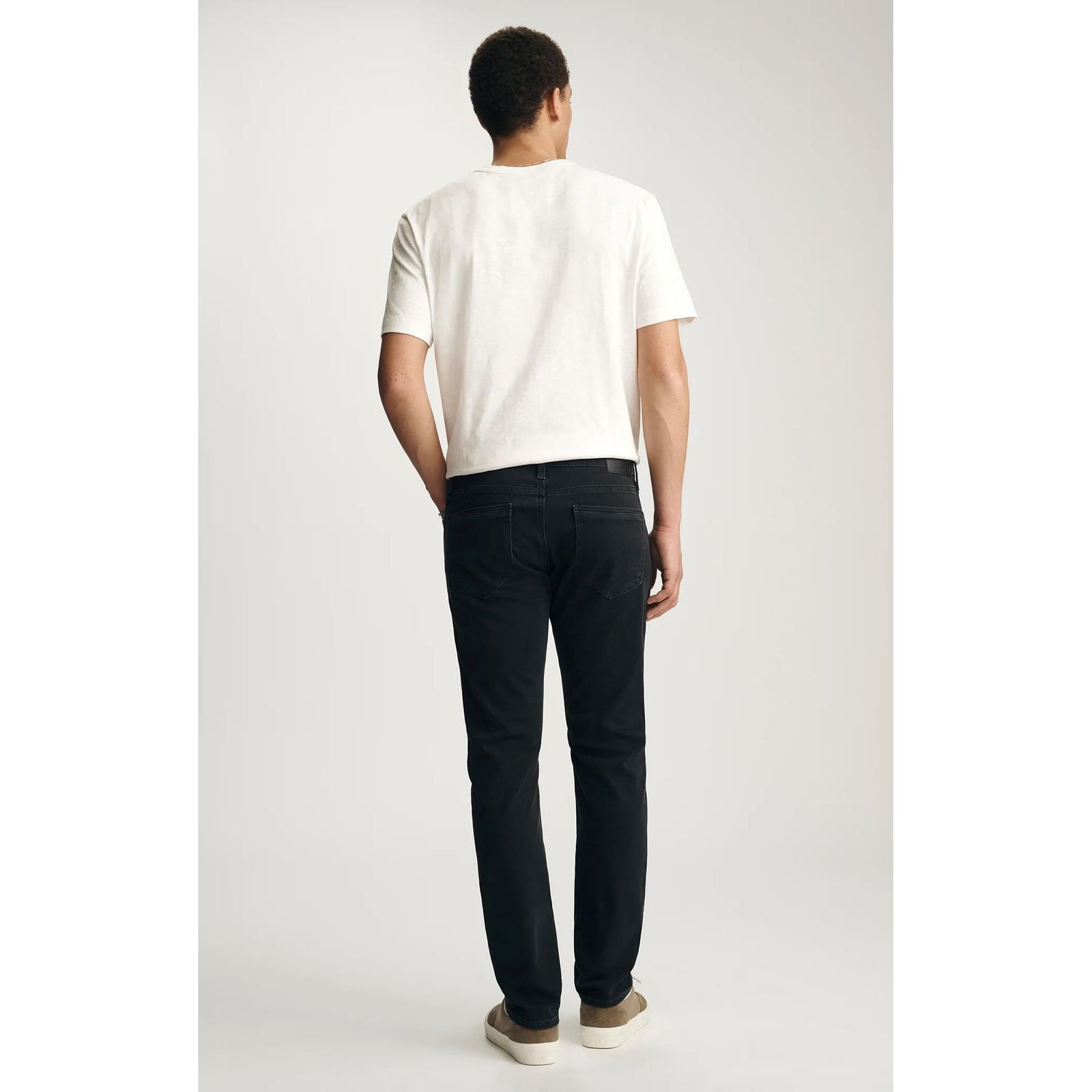 Mavi Jake Smoke Explorer Denim in washed-out black, regular rise, slim through hip and thigh, back view