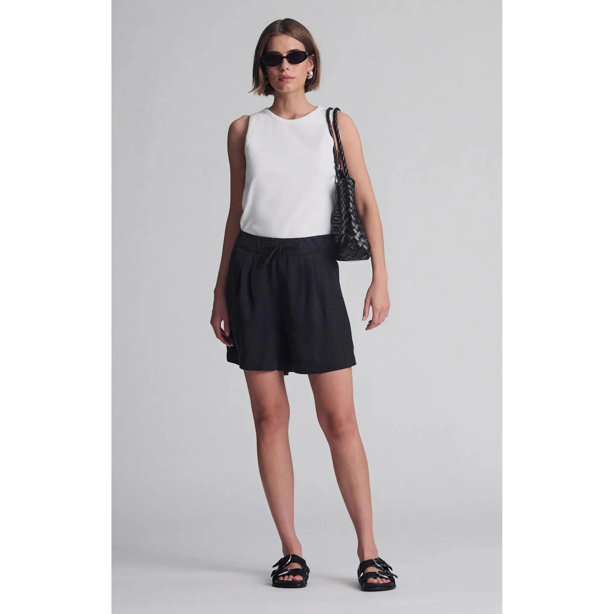 Stylish Mavi Penny shorts in black with a drawstring waist, perfect for summer strolls and hangouts.