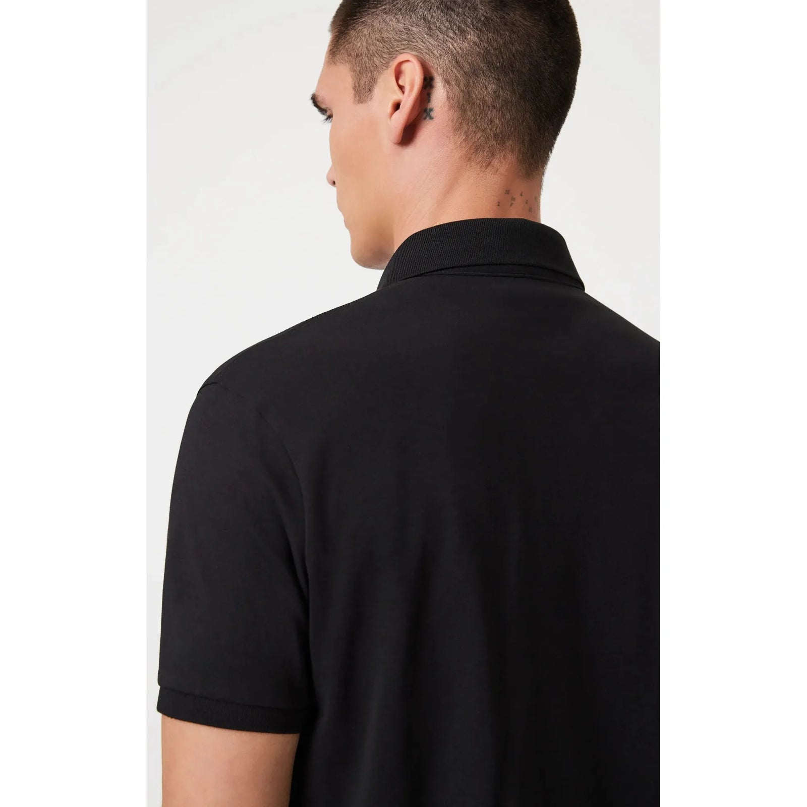 Mavi Athletic Polo Shirt in sleek black with a slim fit, featuring a point collar and iconic button placket.
