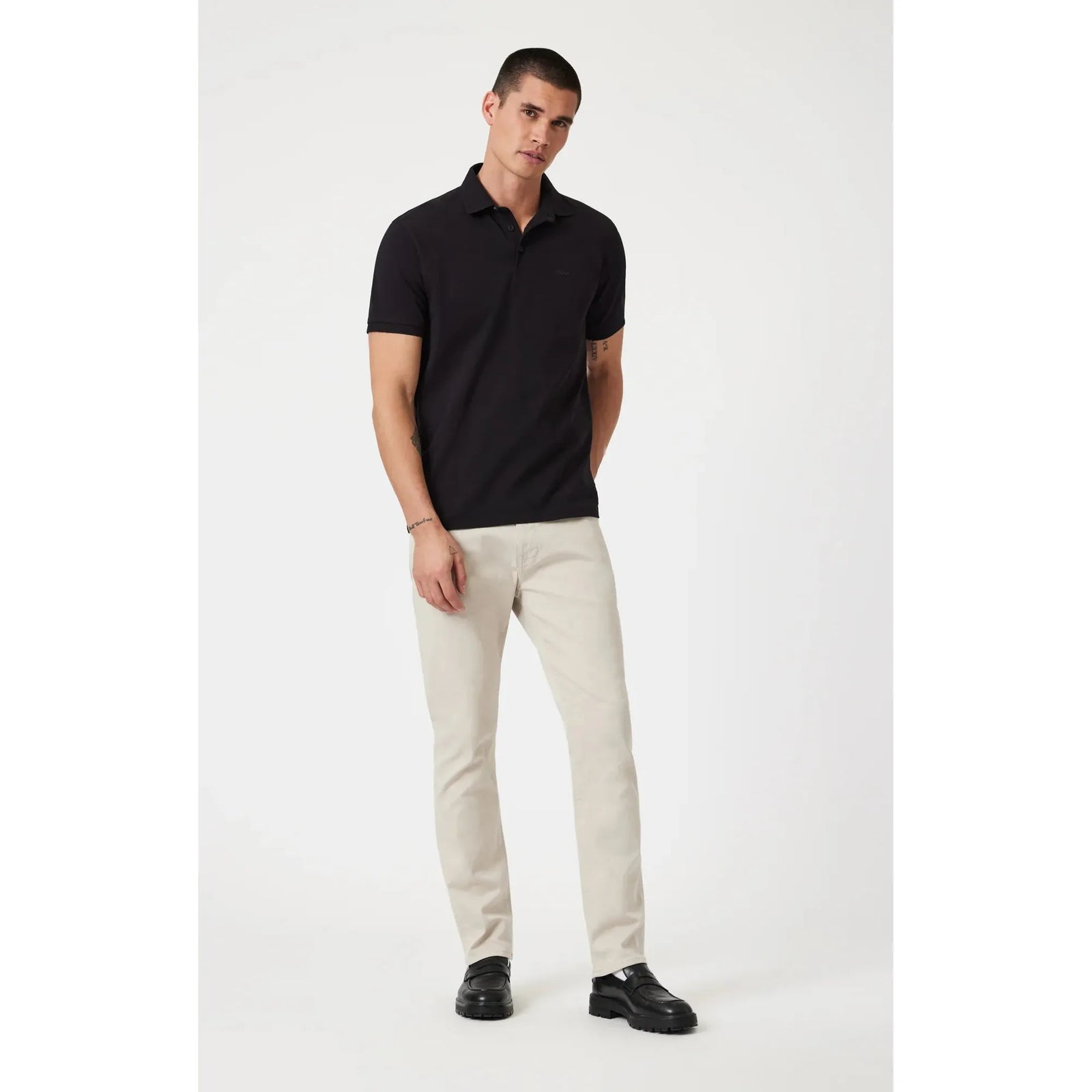 Stylish Mavi Athletic Polo Shirt in black offers a slim fit and classic appeal with a point collar and button placket.